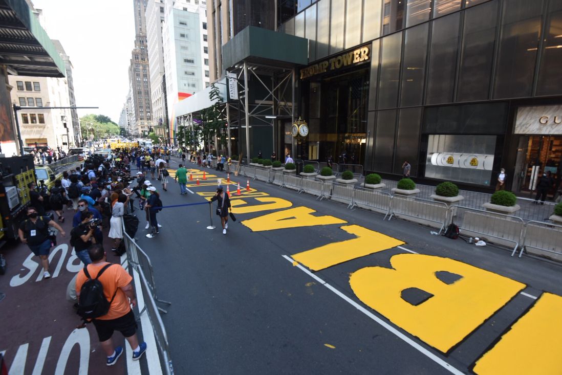 Photos of people painting Black Lives Matter in front of Trump Tower on June 9th, 2020